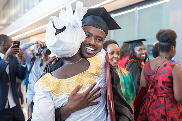 Student hugging at graduation