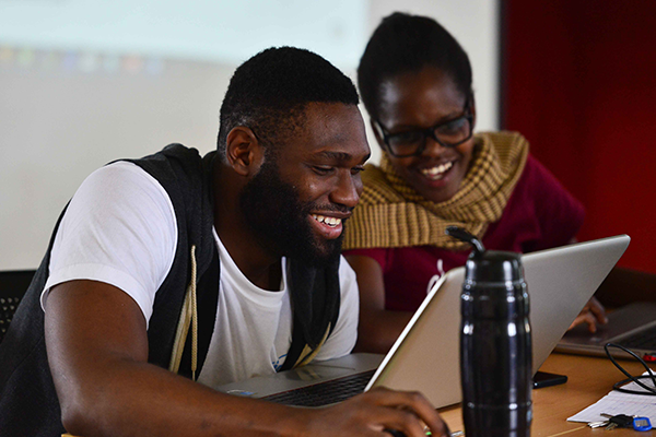 Students working on computer