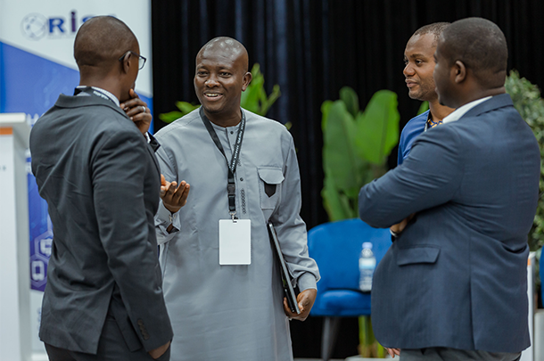 Faculty talking at conference