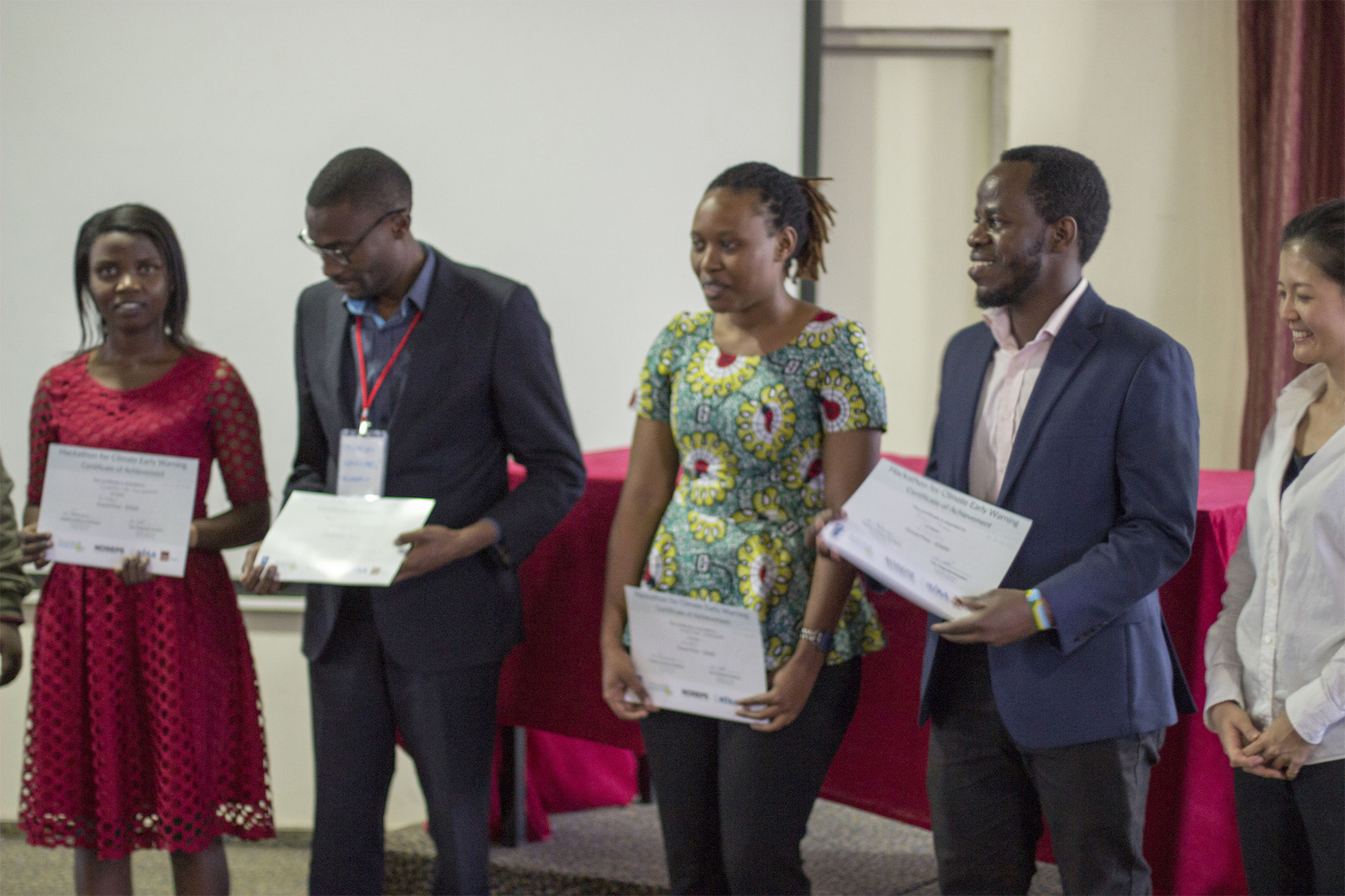 L-R: Jeannette Mukamana, Michael Nayebare, Martine Habimana and Roger Mizero after being declared winners in Kayonza district, Eastern Rwanda.