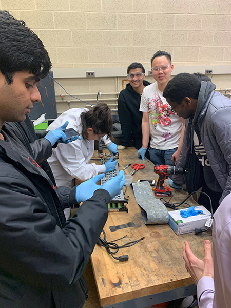 researchers working in a lab session