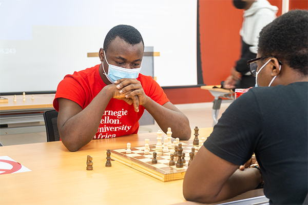 Students doing chess