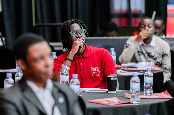 Student in audience at forum