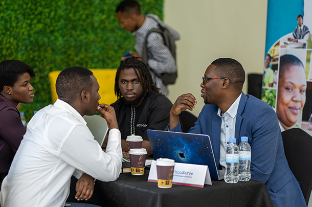 Students conversing at a job fair