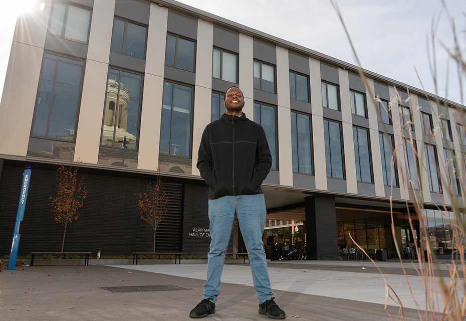 Student standing on campus