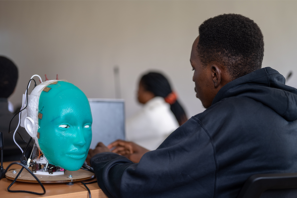 Student with robotic head