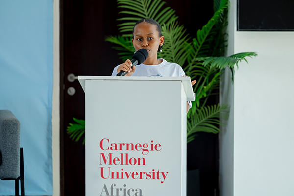 Woman speaking at podium
