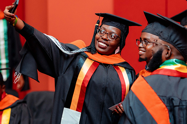 Graduates taking a selfie
