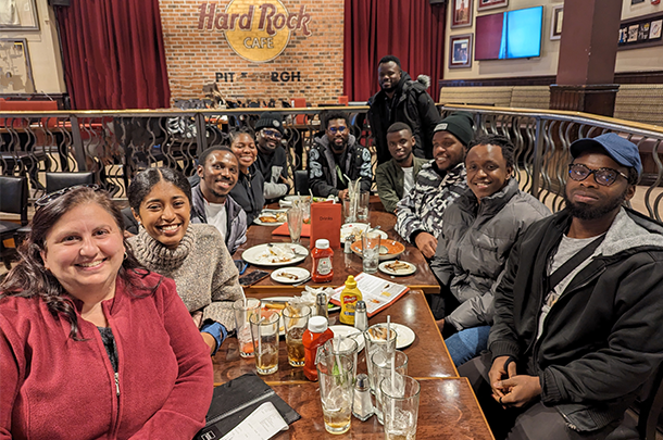 Group photo of students at dinner